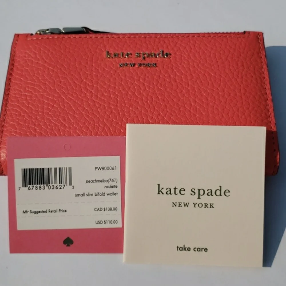 Kate Spade Leather Roulette Small Slim Bifold Wallet. Color: Peachmelba.